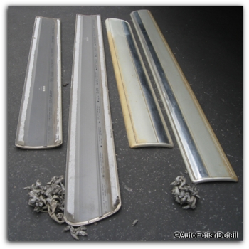 faded truck side door rails laying on the ground lined up next to each other faded truck side door rails