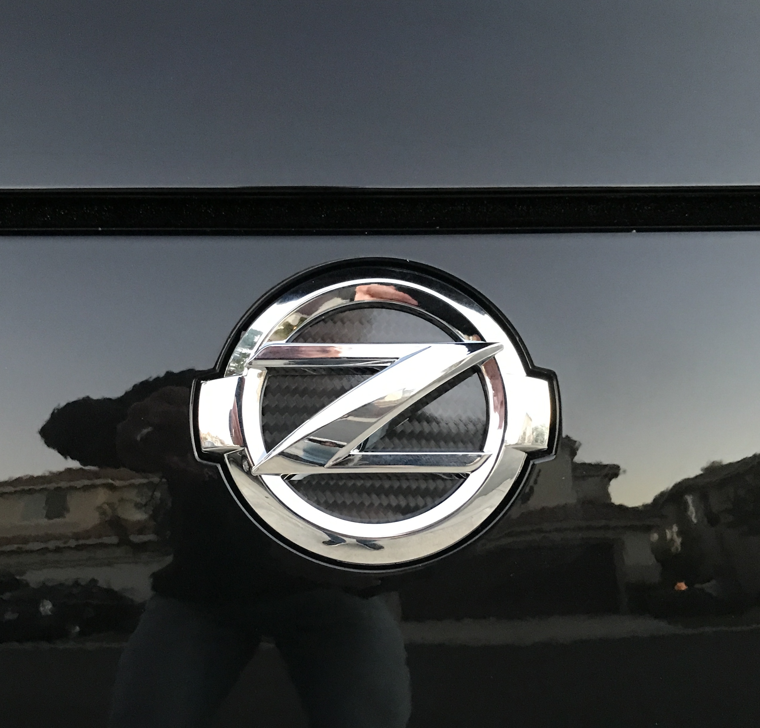 nissan 370z emblem replacement